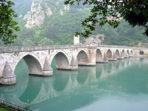 "Visegrad bridge by Klackalica". Licensed under CC BY 2.5 via Wikimedia Commons - http://commons.wikimedia.org/wiki/File:Visegrad_bridge_by_Klackalica.jpg#/media/File:Visegrad_bridge_by_Klackalica.jpg